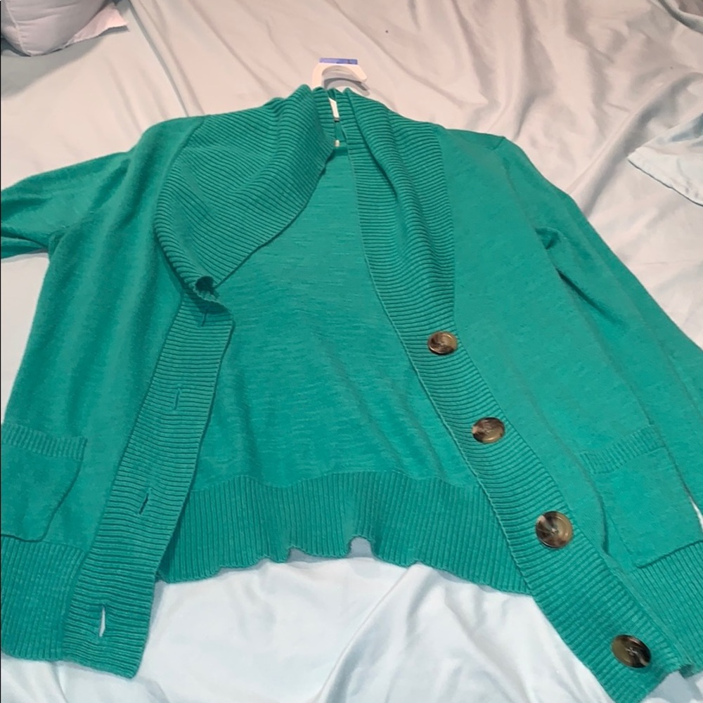 long green cardigan with buttons down the sides